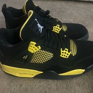 Jordan 4 Black and Yellow Sneakers
